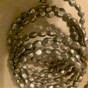 Silver toned wrap braclet. Great condition- have had a while but never wear 2/20